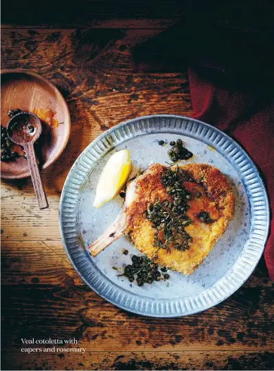  ??  ?? Veal cotoletta with capers and rosemary