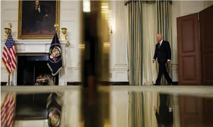  ?? Photograph: Samuel Corum/Getty Images ?? President Joe Biden walks into the State Dining Room to deliver remarks on the Hamas attacks in Israel at the White House on Saturday.