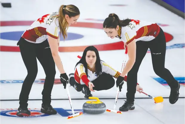  ?? JEFF MCINTOSH / THE CANADIAN PRESS ?? Team Canada skip Kerri Einarson — shown here making a shot against Team Alberta as lead Briane Meilleur, left, and second Shannon Birchard
sweep in the semifinal at the Scotties Tournament of Hearts — faced Team Ontario’s Rachel Homan in the final Sunday.