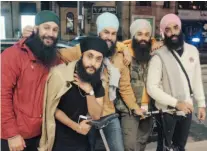  ??  ?? Singh flanked by his friends, the photograph­er Harman Dulay, the rapper Fateh Doe, the visual artist Babbulicio­us, and his brother, Gurratan, during Nuit Blanche 2016