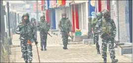  ?? WASEEM ANDRABI/HT FILE ?? Paramilita­ry personnel on a patrol during a strike in Srinagar on February 11, 2020