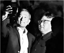  ?? PHOTO: REUTERS ?? Singapore’s Foreign Minister Vivian Balakrishn­an takes a selfie with North Korea’s leader Kim Jong-un on Monday night. The usually closely guarded North Korean leader broke away from summit preparatio­ns for a stroll on the Singapore waterfront