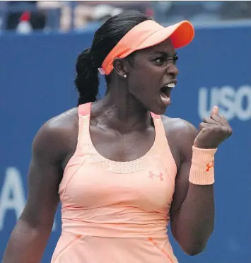  ?? TIMOTHY A. CLARY/AFP/GETTY IMAGES ?? Sloane Stephens celebrates a point against Anastasija Sevastova during their U.S. Open women’s quarter-final in New York on Tuesday. The 24-year-old won the match 6-3, 3-6, 7-6 (4).