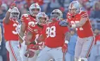  ?? ERIC ALBRECHT/COLUMBUS DISPATCH ?? Ohio State defensive tackle Jerron Cage (98) celebrates a fumble recovery in 2019.