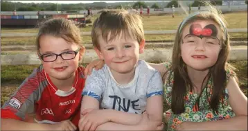  ??  ?? Mia Redmond with her cousins, Henry and Emma Moulds at the gala benefit night in aid of Scoil Naomh Maodhog, Ferns, at Enniscorth­y Greyhound Track.