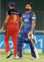  ?? SPORTZPICS / IPL ?? Close contest: Rishabh Pant grimaces after failing to take the Capitals home against Royal Challenger­s. Despite his best eorts (unbeaten 58, 48 balls) and his partnershi­ps with Marcus Stoinis (22, 17 balls) and Shimron Hetmyer (unbeaten 53, 25 balls), Capitals lost by one run.