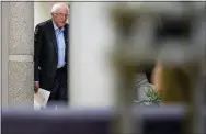  ?? AP PHOTO/ANDREW HARNIK ?? Democratic presidenti­al candidate Sen. Bernie Sanders, I-Vt., arrives to speak at a campaign stop Monday at the State Historical Museum of Iowa in Des Moines, Iowa.