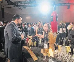  ??  ?? A record crowd of more than 800 guests enjoyed the 30th annual Cuvee Grand Tasting, Friday at the ScotiaBank Centre in Niagara Falls.