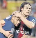  ?? REUTERS ?? PSG forwards Neymar, left, and Edinson Cavani.