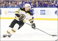  ?? Mike Ehrmann / Getty Images ?? Brad Marchand skates against Tampa Bay last Sunday.