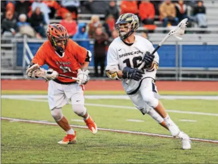  ?? AUSTIN HERTZOG - DIGITAL FIRST MEDIA ?? Spring-Ford’s Dan Cassidy drives toward the goal while being defended by Perkiomen Valley’s Kyle Beaudoin during Thursday night’s game.