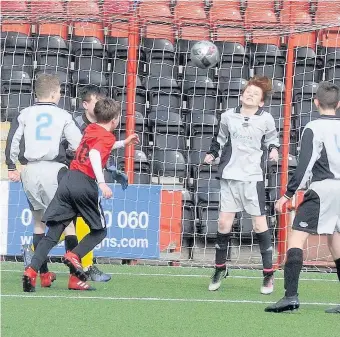  ??  ?? Goals galore St Ambrose go on the attack