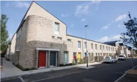  ??  ?? Goldsmith Street in Norwich is made up of almost 100 ultra low-energy homes. Photograph: Graeme Robertson/The Guardian