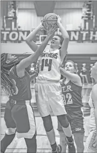  ?? Courier file photo ?? Benton sophomore Madison Mcintire, 14, puts up a shot in a game this past year. Mcintire earned All-conference honors.