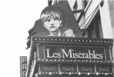  ?? TINA FINEBERG / AP PHOTO FILES ?? A marquee for the theatre show Les Misérables in New York in 2003. Screenwrit­er Andrew Davies has adapted Victor Hugo's epic novel into a six-part series for BBC One.