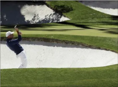  ?? DAVID J. PHILLIP — THE ASSOCIATED PRESS ?? Sergio Garcia reacts after nearly chipping in for birdie on the 12th hole during the second round of the Masters on Friday.