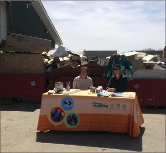  ?? June McInnes The McLeod River Post ?? Ladies that were happy to talk about recycling at the Edson & District Recyling Society’s E-waste and Toxic Round Up day on Saturday, May 12. All smiles