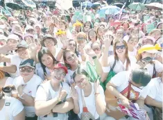  ?? BY MIKE DE JUAN PHOTO ?? n Hundreds of women pose for pictures during a dance activity kicking off celebratio­ns of March as Internatio­nal Women’s Month in Quezon City on March 6, 2024.