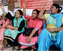  ?? — Asian Age ?? MCD workers during a protest at civic centre in New Delhi on Wednesday.