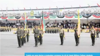  ??  ?? Cadets are seen during a graduation ceremony for Ali Al-Sabah Military College students.