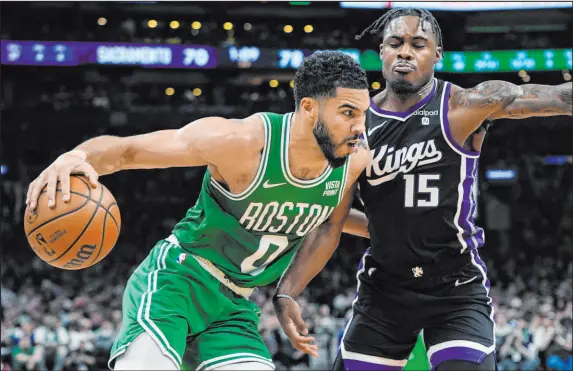  ?? Michael Dwyer The Associated Press ?? Forward Jayson Tatum has led the Celtics’ high-powered offense in scoring this season at 26.9 points per game.