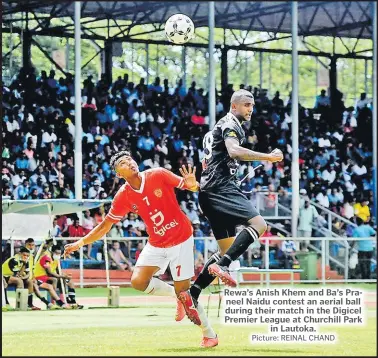  ?? Picture: REINAL CHAND ?? Rewa’s Anish Khem and Ba’s Praneel Naidu contest an aerial ball during their match in the Digicel Premier League at Churchill Park in Lautoka.