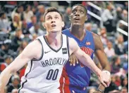  ?? Getty Images ?? A TALL ORDER: Rodions Kurucs will be needed to play some center for the shorthande­d Nets when the season resumes.