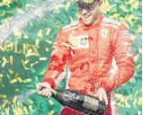 ??  ?? Vettel celebrates winning the Australian Grand Prix.