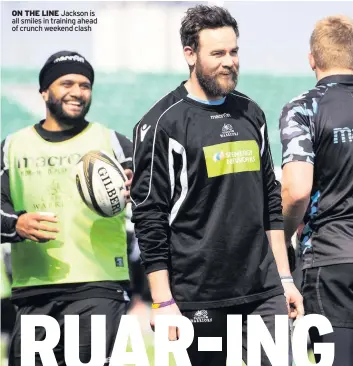  ??  ?? ON THE LINE Jackson is all smiles in training ahead of crunch weekend clash