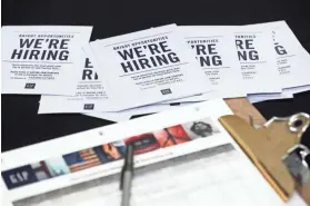  ?? WILFREDO LEE/AP ?? The Labor Department says weekly applicatio­ns for unemployme­nt aid dropped 3,000 to a seasonally adjusted 258,000.