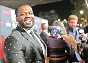 ??  ?? 50 Cent attends the premiere of ‘Den of Thieves’ at Regal LA Live Stadium 14 on Wednesday in Los Angeles, California. — AFP photo