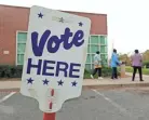  ?? CHUCK BURTON/AP ?? Companies aren’t required to shut down on Nov. 6, for the election, but many give their staffers paid time off to go to the polls.