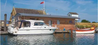  ??  ?? A new floating facilities barge was opened in 2016 with showers, toilets and a utility room for the use of visiting yachtsmen