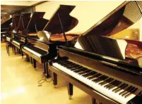  ??  ?? Yamaha grand pianos