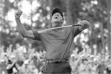  ?? DAVID J. PHILLIP/AP ?? Tiger Woods reacts to his stunning win at the 2019 Masters golf tournament in Augusta, Ga., giving him his 15th major title and first in 11 years.