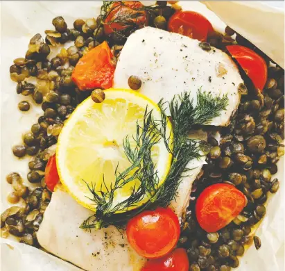  ??  ?? Northern Pike and Lentils En Papillote provides not only a photogenic meal, but an enticing aroma.