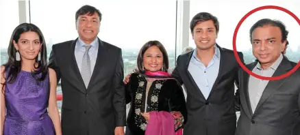  ??  ?? Big spenders: The Mittal family with brothers Lakshmi (second from left) and Pramod (circled, right)