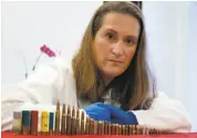  ?? Paul Chinn / The Chronicle ?? Dr. Judy Melinek, a forensic pathologis­t in S.F., displays shotgun shells and bullets she uses as educationa­l tools.
