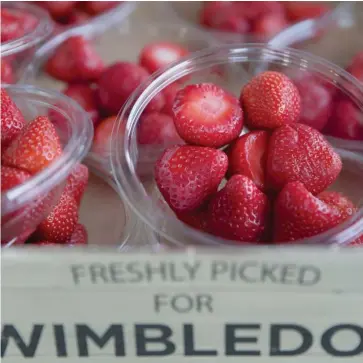  ?? (Photo by Tim Ireland, AP) ?? Strawberri­es are on display for sale on day five at the Wimbledon Tennis Championsh­ips in London Friday.