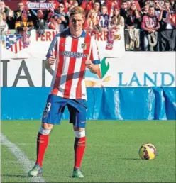  ??  ?? Fernando Torres, durante su presentaci­ón con el Atlético en 2015.