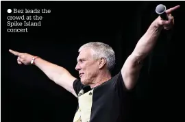  ??  ?? ● Bez leads the crowd at the Spike Island concert