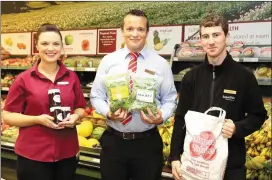  ??  ?? Stacey Reen, Manager Ger Healy and Joe Carver in the Fruit & Veg Department at Twohig’s SuperValu in Kanturk.