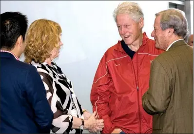  ??  ?? Dennis Cheng, Liv Ullmann, former President Bill Clinton and Donald Saunders