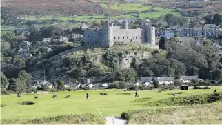  ??  ?? Royal St. David’s is a glorious links golf course in Wales, a country with tremendous local cuisine.