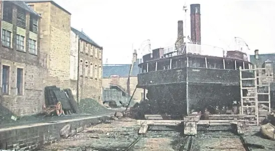  ??  ?? “Mention was made in the column of the Patent slip in the piece about the paddle steamer Bonnie Dundee,” says Jim Howie of Broughty Ferry. “Here is a postcard of it, with a ship named Dundee on the stocks and a crowd of workmen under the bow.”