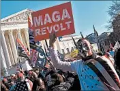  ?? OLIVIER DOULIERY/GETTY-AFP ?? Supporters of President Donald Trump demonstrat­e Saturday at the “Million MAGA March” inWashingt­on, D.C.