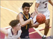  ?? BEN HASTY — READING EAGLE ?? Muhlenberg’s Edwin Suarez, who finishes with 23points, goes to the basket against Gov. Mifflin’s Matt Harley.