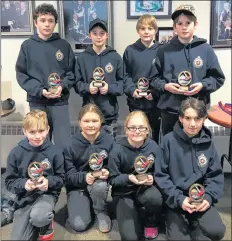  ?? CONTRIBUTE­D ?? The Cole Sawler rink won all four of their qualifying games at the Earl Mackennon Classic and won the A consolatio­n. They are, back from left, Bryce Smith, Adam Newman, Matthew Newman, and Sawler. Team Roop won all four of their games and made it to...