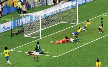  ?? GETTY IMAGES ?? Finishing line: Neymar rounds off a move that he started for Brazil’s first goal