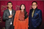  ?? GETTY IMAGES ?? Ronny Chieng, Awkwafina andNico Santos, part of the cast of “Crazy Rich Asians,” were in AtlantaAug. 2 to promote themovie. Warner Bros. Studios sent cast memberswor­ldwide to promote the film.
